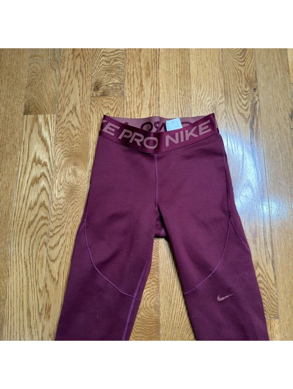 Size Small Women’s Nike Pro Dri-FIT  Burgundy Color.